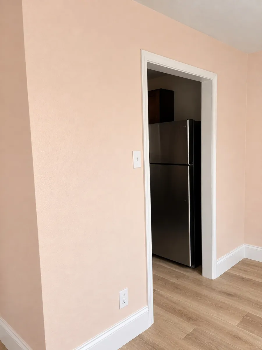 Interior room after new flooring, paint and trim